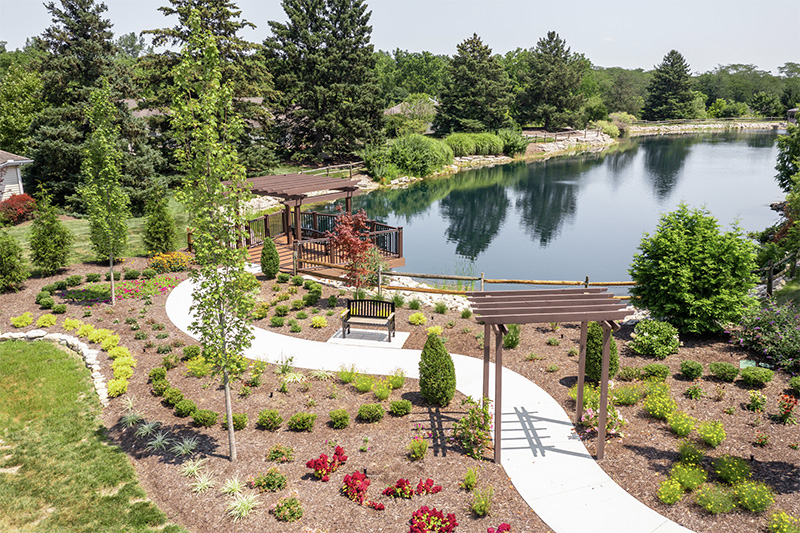 Garden pond and gazebo on the Willow Brook campus in Delaware, Ohio, illustrating the outdoor amenities at this senior living community.