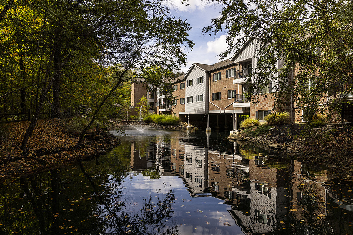 Willow Brook Village in Delaware, Ohio, viewed across the campus pond — a defining scene of this senior living community.