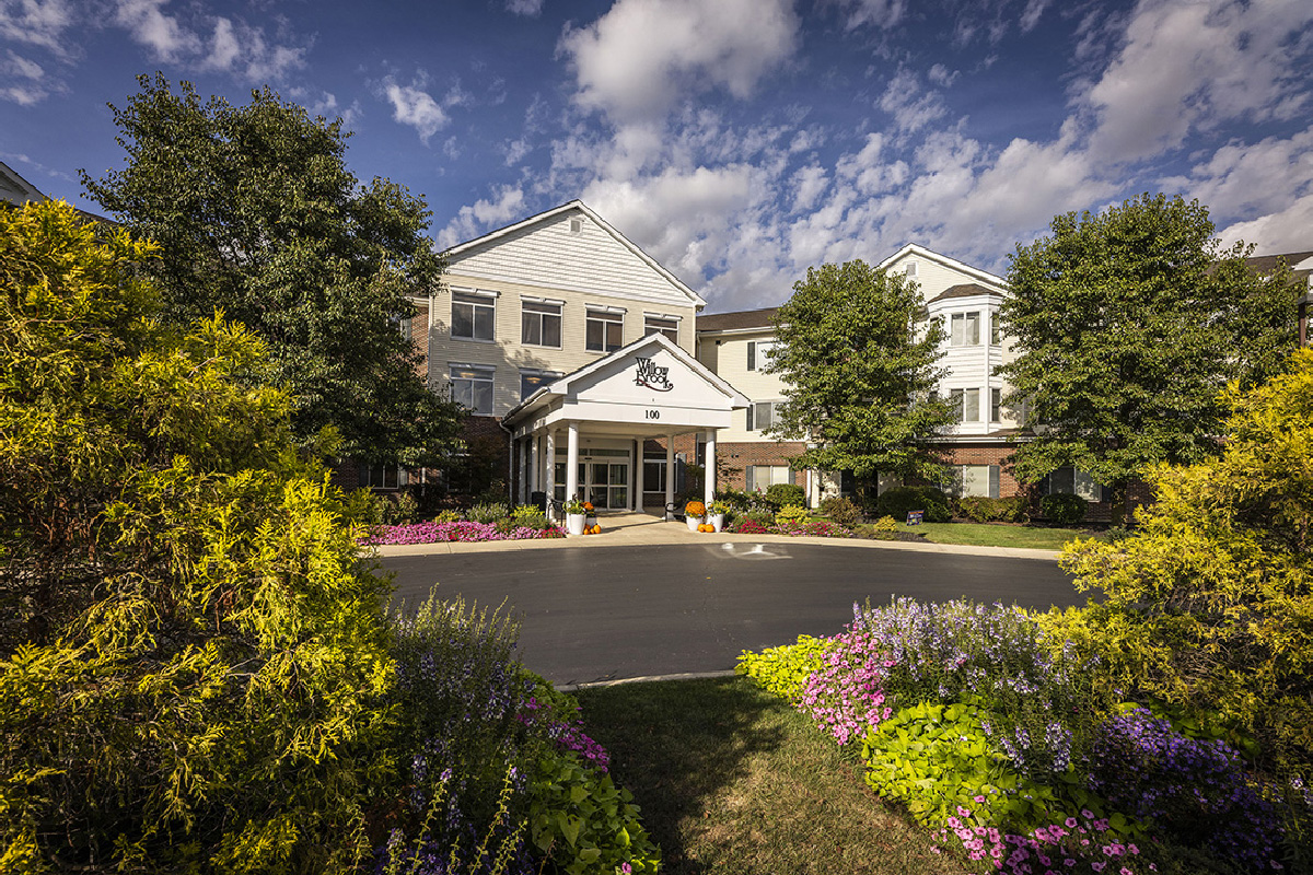 Front exterior of Willow Brook Run in Delaware, Ohio, capturing the welcoming covered entrance of this senior living community.