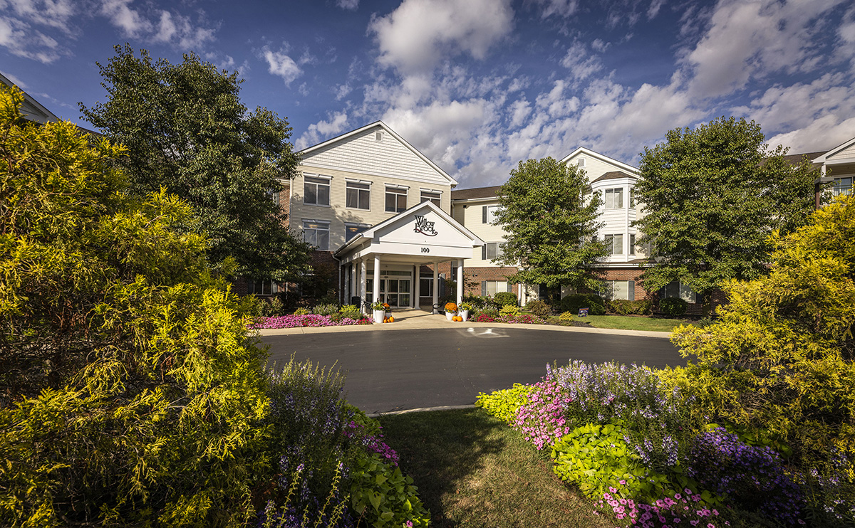 Wide front exterior of Willow Brook Run in Delaware, Ohio, capturing the residence and landscaping of this senior living community.