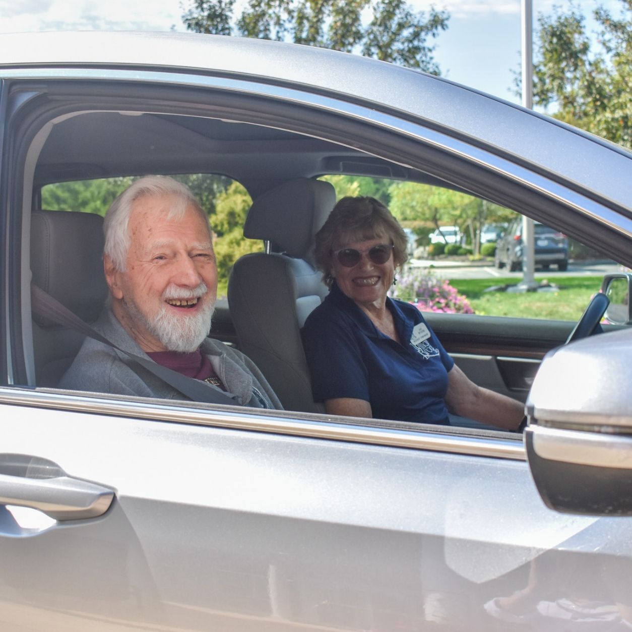 A resident enjoys a transportation outing at Willow Brook in Delaware, Ohio, used as the Companion Services page header circle image.