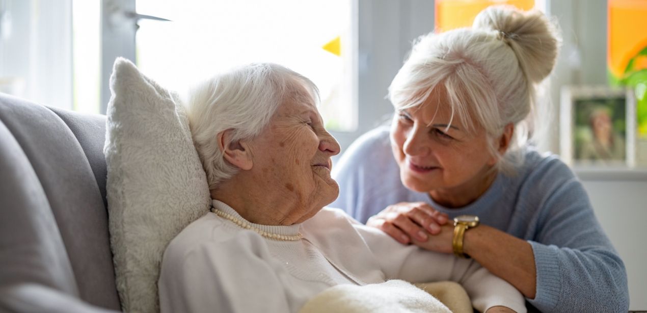 A two-column long-term care moment at Willow Brook in Delaware, Ohio, capturing the compassionate care that supports residents through every chapter.