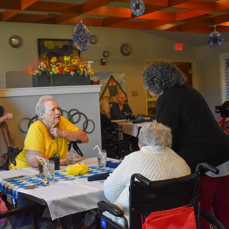 Mealtime moment at the Heritage dining room at Willow Brook Home in Columbus, Ohio, used as the mobile header for the dining page.