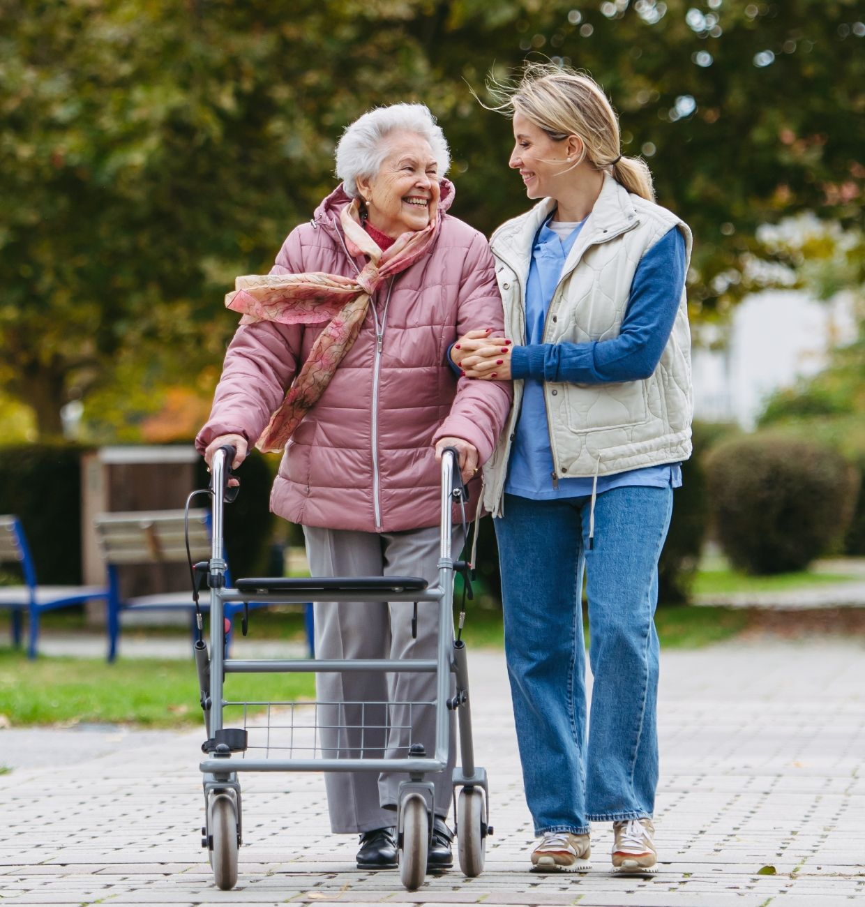 A transitional living resident enjoys a walk with caregiver support at Willow Brook in Delaware, Ohio, featured in the home page lifestyle section.