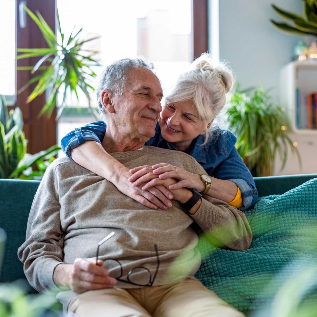 A loving couple shares a moment at Willow Brook in Delaware, Ohio, used as the Lifestyle page header circle image for the senior living community.