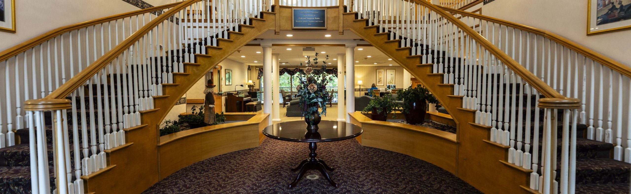Wide desktop banner of the Willow Brook Village atrium in Delaware, Ohio, used as the floor plans page header.