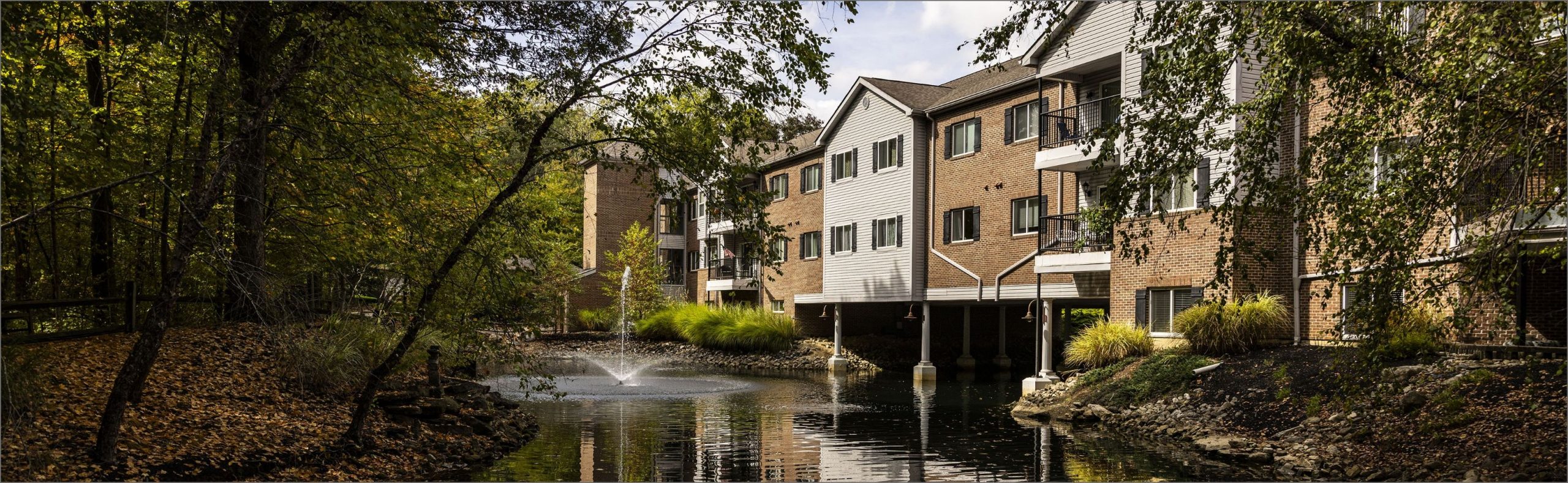 Wide desktop banner of Willow Brook Village in Delaware, Ohio, used as the landing page header for this senior living community.