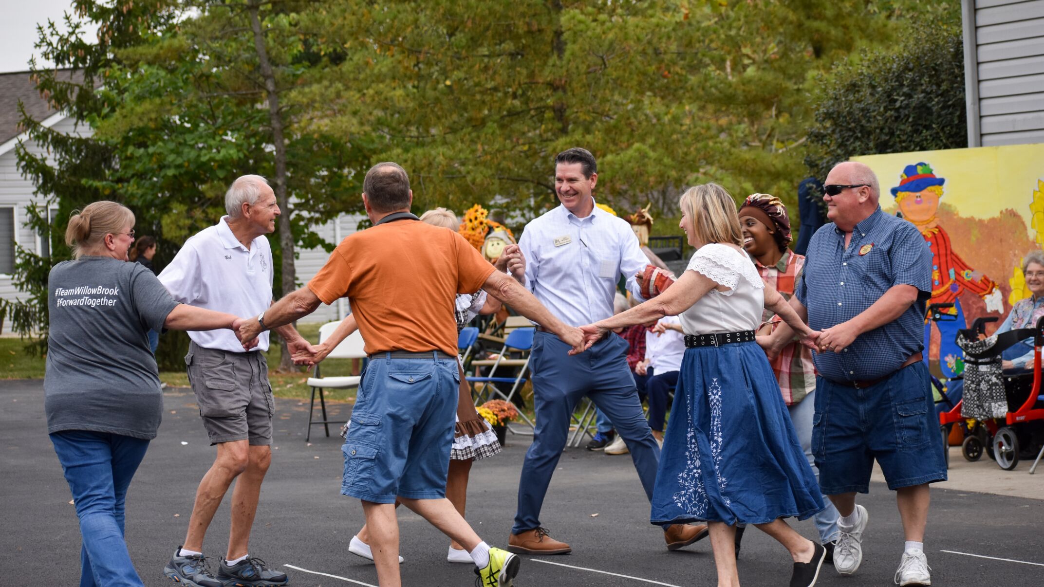A community dance brings residents together at Willow Brook in Delaware, Ohio, capturing the lively events that fill the senior living calendar.
